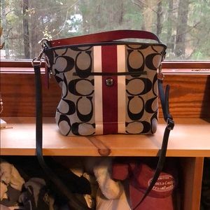 Coach Hampton’s weekend signature stripe purse